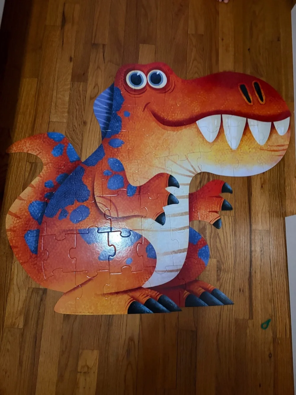 Crocodile Creek Jumbo Shaped Dinosaur Puzzle - Orange & Blue